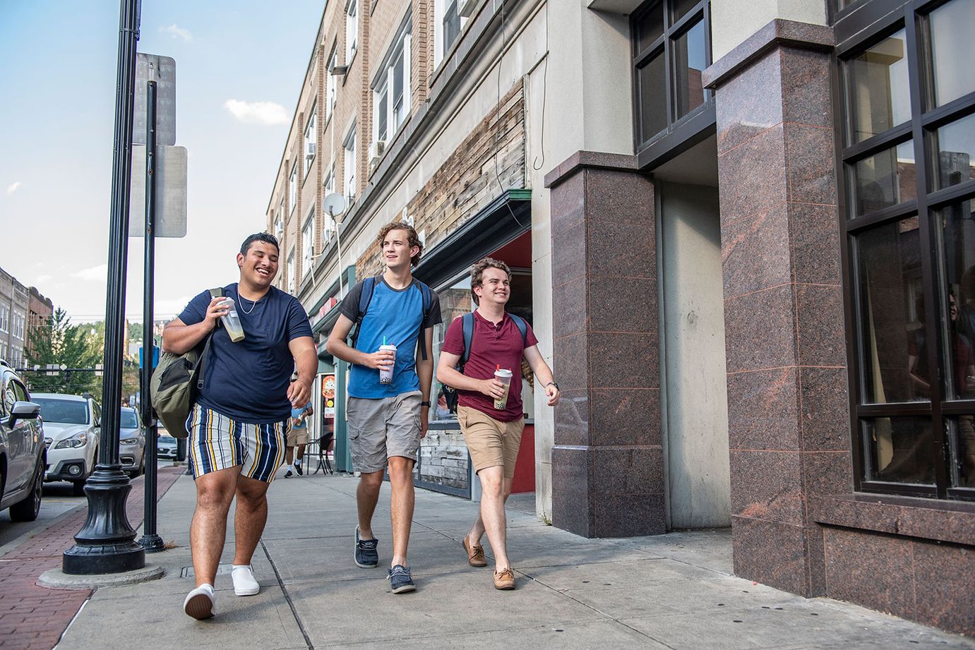 students walk downtown